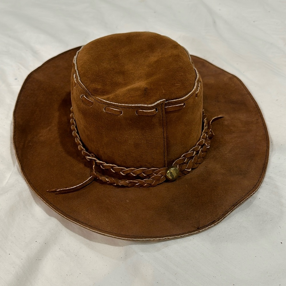 Brown suede, cowboy hat